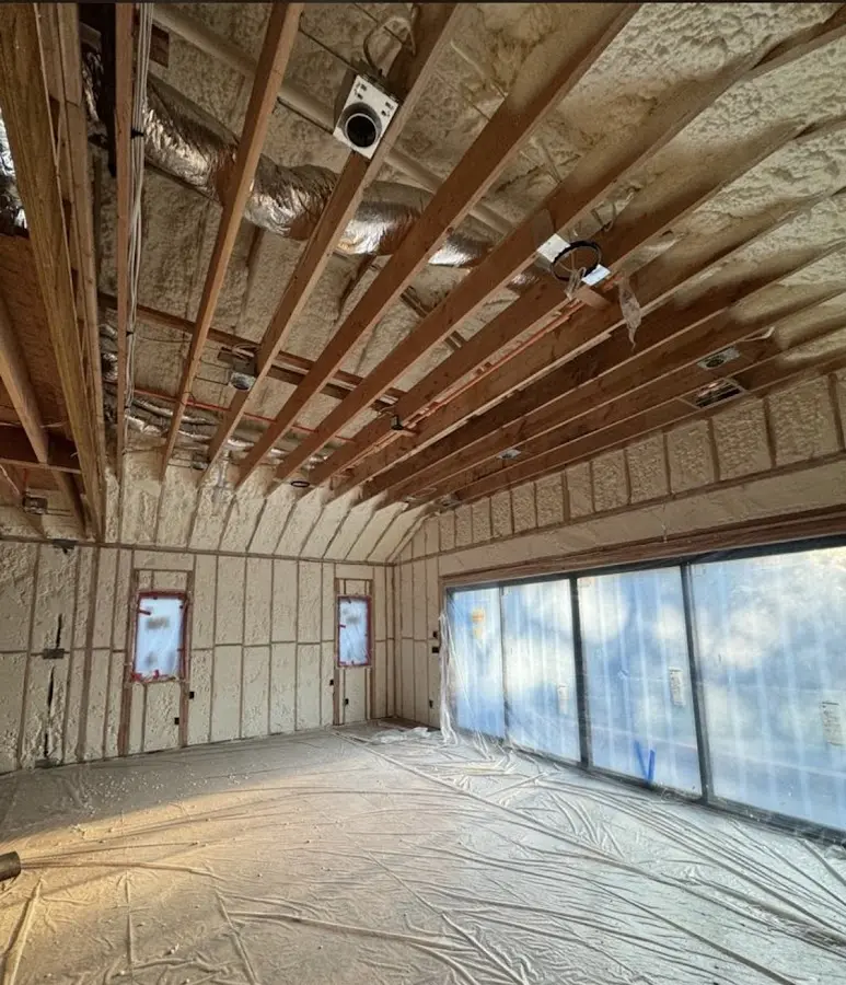 Interior walls and ceiling insulated with spray foam during new construction in Rosedale